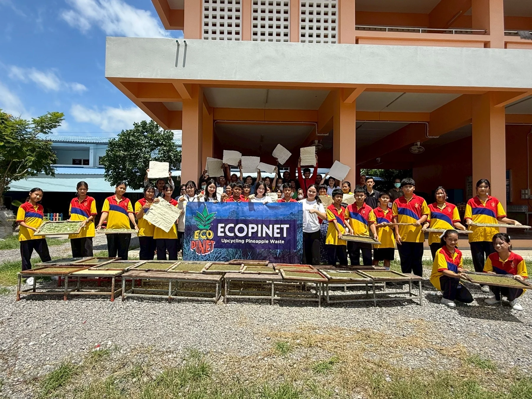 Group photo outside a community venue